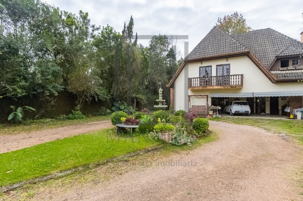 Casa com 4 dormitórios à venda, 680 m² por R$ 2.050.000,00 - T...