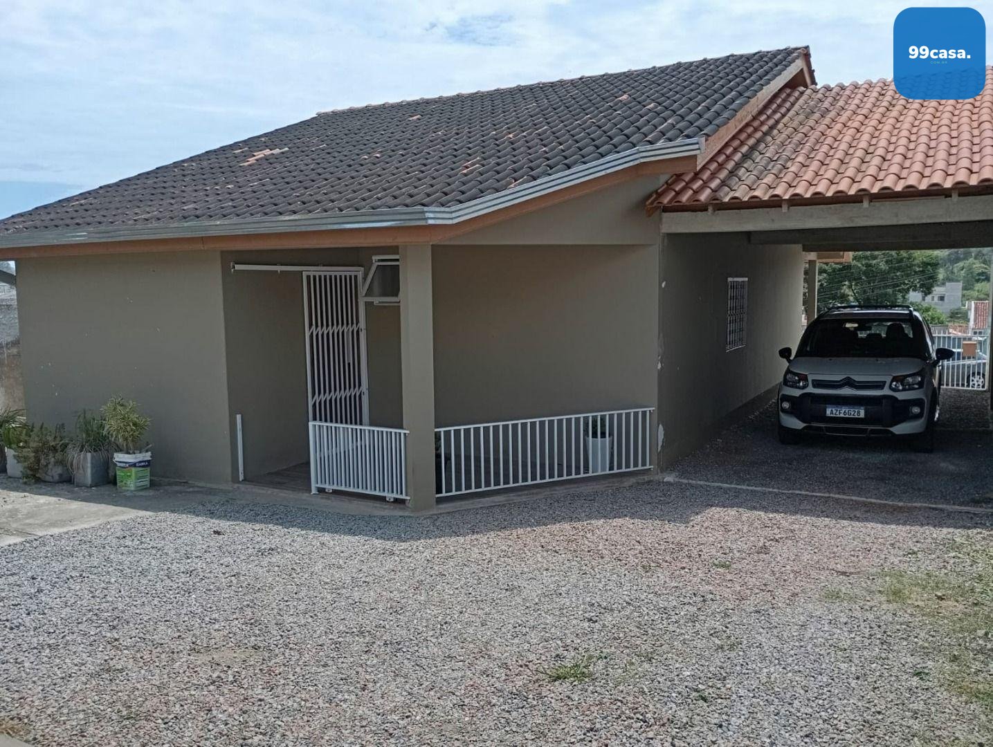 Terreno com Casa e Garagem de 5 Vagas  Conforto e Espaço em Lo...