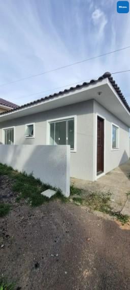 Casa em condomínio com quintal. Tranquilidade e segurança a 20...