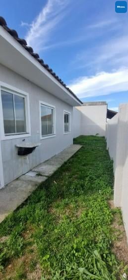 Casa em condomínio com quintal. Tranquilidade e segurança a 20...