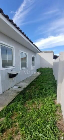 Casa em condomínio com quintal. Tranquilidade e segurança a 20...