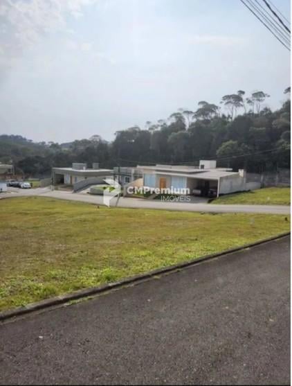 Terreno de 308m  em condomínio fechado em Colombo por R 170 mil 