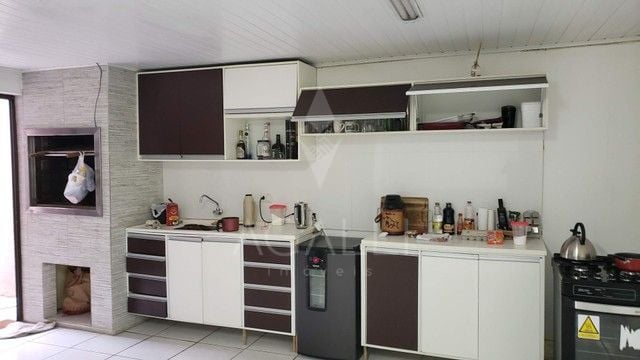 Casa com 3 dormitórios à venda, 232 m  por R  840.000,00 - Ube...